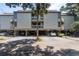 Tan building exterior with covered parking below at 1637 Live Oak Park, Seabrook Island, SC 29455