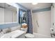 Clean bathroom with a shower/tub combo and coastal decor at 1637 Live Oak Park, Seabrook Island, SC 29455
