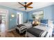 Twin bedroom with light blue walls and ensuite bathroom at 1637 Live Oak Park, Seabrook Island, SC 29455
