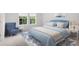 Bedroom with a blue upholstered bed and a sitting area at 1020 Lovebug Ln, Summerville, SC 29485