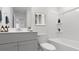 Single vanity bathroom with gray cabinets and a shower/tub combo at 1020 Lovebug Ln, Summerville, SC 29485