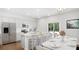 Island kitchen with white cabinets, granite countertops and stainless steel appliances at 1020 Lovebug Ln, Summerville, SC 29485