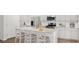 Modern kitchen with grey cabinets, granite countertops, and stainless steel appliances at 1020 Lovebug Ln, Summerville, SC 29485