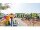 Playground with playhouse and climbing equipment at 1020 Lovebug Ln, Summerville, SC 29485