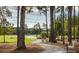 Park with walking path and benches near pond at 1020 Lovebug Ln, Summerville, SC 29485