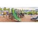 Playground with modern play equipment and wood chips at 1020 Lovebug Ln, Summerville, SC 29485