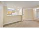 Open concept kitchen with light wood cabinets and a breakfast bar at 1025 Riverland Woods Pl # 610, Charleston, SC 29412
