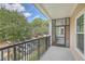 Private balcony overlooking the community and parking area at 1025 Riverland Woods Pl # 610, Charleston, SC 29412