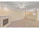 Spacious living room featuring a fireplace and neutral carpeting at 1025 Riverland Woods Pl # 610, Charleston, SC 29412