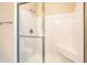 Clean shower with white tile and glass enclosure at 1025 Riverland Woods Pl # 610, Charleston, SC 29412