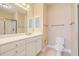 Bathroom with white vanity, toilet, and shower at 1025 Riverland Woods Pl # 610, Charleston, SC 29412