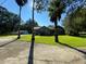 Brick house with a large yard and palm trees at 1229 Central Ave, Summerville, SC 29483