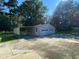 Two-car garage with covered carport at 1229 Central Ave, Summerville, SC 29483
