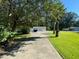 Two-car detached garage with a long driveway at 1229 Central Ave, Summerville, SC 29483
