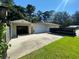 Detached three car garage with additional workshop space at 1229 Central Ave, Summerville, SC 29483
