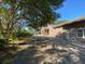 Long driveway leading to a brick house at 1229 Central Ave, Summerville, SC 29483
