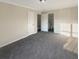 Spacious bedroom with neutral carpeting and ample closet space at 9068 Maple Grove Dr, Summerville, SC 29485