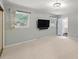 Large bedroom with light gray walls, carpet, and a view to the bathroom at 102 Reynard Ct, Summerville, SC 29485