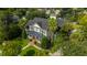 Aerial view of a two-story house with a metal roof and landscaped yard at 775 Navigators Run, Mount Pleasant, SC 29464