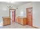 Kitchen with wood cabinets and a view into another room at 380 Ashley Ave, Charleston, SC 29403