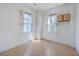 Room with hardwood floors and two windows at 380 Ashley Ave, Charleston, SC 29403