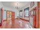 Dining room with hardwood floors, fireplace, and chandelier at 380 Ashley Ave, Charleston, SC 29403