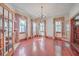 Bright dining room featuring hardwood floors and a chandelier at 380 Ashley Ave, Charleston, SC 29403