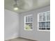 Bright bedroom with two windows and hardwood floors at 1586 Highway 15, Saint George, SC 29477
