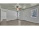 Spacious living room with light walls, wood-look floors, and a ceiling fan at 1586 Highway 15, Saint George, SC 29477