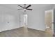 Spacious bedroom with ceiling fan and hardwood floors at 1586 Highway 15, Saint George, SC 29477