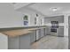 Modern gray kitchen with stainless steel appliances and a wood countertop at 1586 Highway 15, Saint George, SC 29477