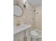Modern bathroom with a walk-in shower and gold fixtures at 1586 Highway 15, Saint George, SC 29477