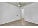 Simple bedroom with ceiling fan and hardwood floors at 1586 Highway 15, Saint George, SC 29477