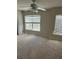 Spacious bedroom with carpet flooring and two windows at 506 Holiday Dr, Summerville, SC 29483