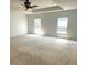Large main bedroom with neutral walls, carpet and two windows at 506 Holiday Dr, Summerville, SC 29483