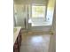 Bathroom featuring a soaking tub and a walk-in shower at 506 Holiday Dr, Summerville, SC 29483