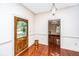 Bright entryway with hardwood floors and view of living room at 8083 Point Of Pines Rd, Edisto Island, SC 29438