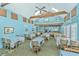 Bright dining room with exposed beams and skylights offering ample natural light at 8083 Point Of Pines Rd, Edisto Island, SC 29438