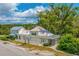 Aerial view of the property highlighting the main house and its unique features at 8083 Point Of Pines Rd, Edisto Island, SC 29438