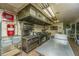 Commercial kitchen with multiple stoves and prep area at 8083 Point Of Pines Rd, Edisto Island, SC 29438