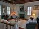 Spacious living room with fireplace and hardwood floors at 8083 Point Of Pines Rd, Edisto Island, SC 29438