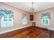 Formal dining room with hardwood floors and chandelier at 8083 Point Of Pines Rd, Edisto Island, SC 29438