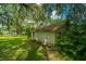 Rustic storage building nestled in a lush green landscape at 8083 Point Of Pines Rd, Edisto Island, SC 29438