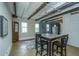 Additional salon space with a table and chairs, exposed beams at 8083 Point Of Pines Rd, Edisto Island, SC 29438