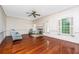Living room with hardwood floors and fireplace at 8083 Point Of Pines Rd, Edisto Island, SC 29438