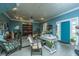 Bright and airy salon with a reception area and waiting chairs at 8083 Point Of Pines Rd, Edisto Island, SC 29438