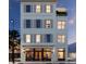 Elegant building with ground floor retail and upper residential units at 284 Meeting St # 201, Charleston, SC 29401