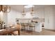 Modern kitchen with white cabinetry, a large island, and high-end appliances at 284 Meeting St # 301, Charleston, SC 29401