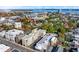 Aerial view of a city neighborhood with a new building and waterfront at 284 Meeting St # 301, Charleston, SC 29401