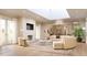 Spacious living room with a marble fireplace and large windows at 284 Meeting St # 301, Charleston, SC 29401